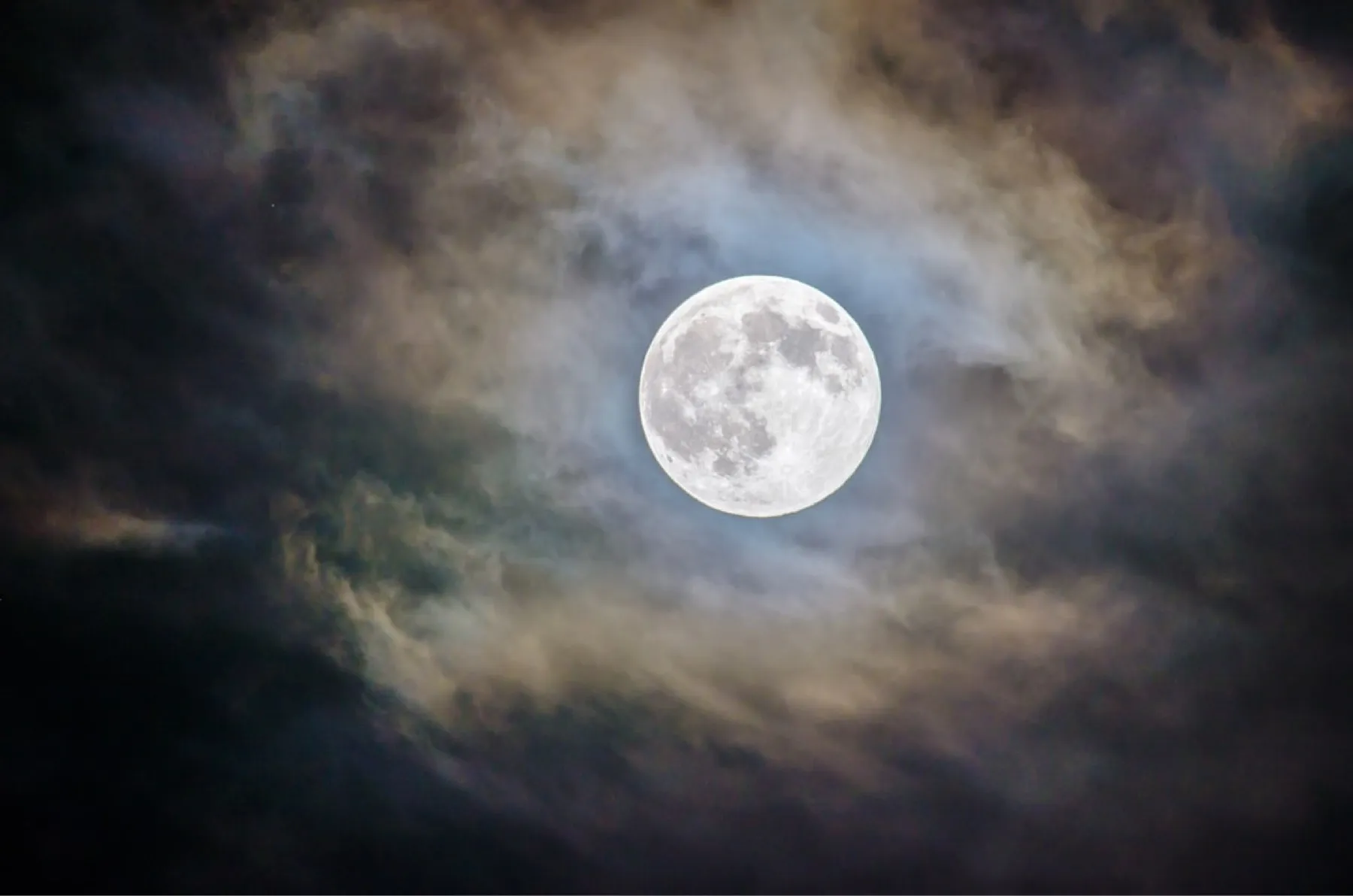 cloudy shot of the moon.